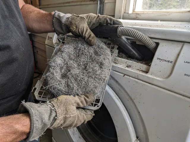 Cleaning Dryer Lint Trap in Miramar